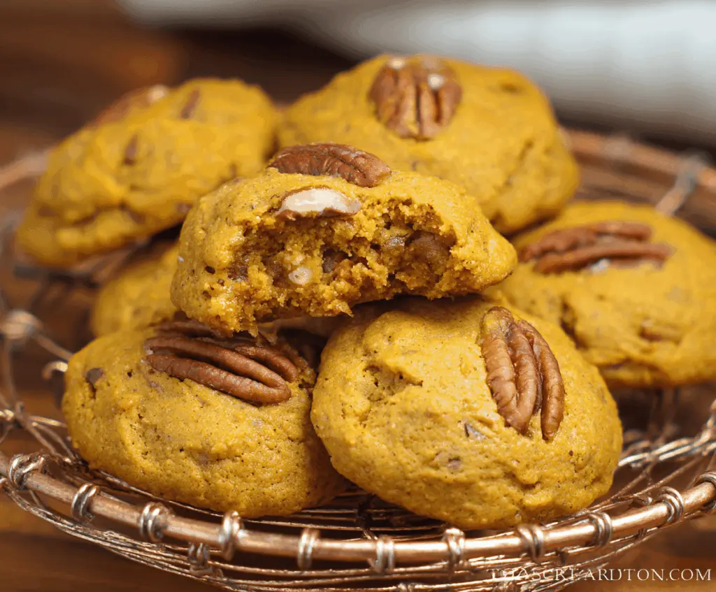 Delicious homemade pumpkin pecan cookies with a golden-brown crust and chopped pecans, perfect for fall desserts.