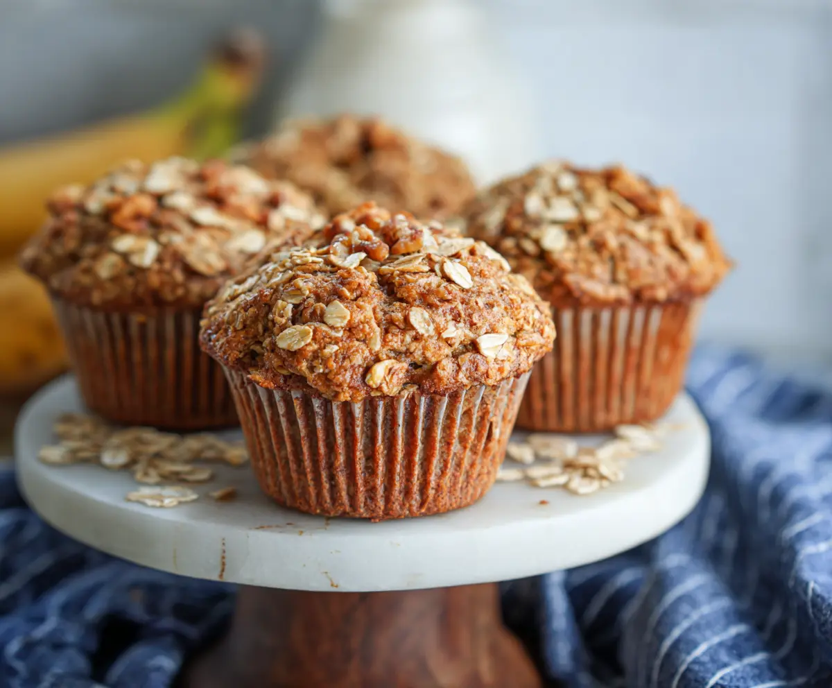 Healthy banana oatmeal muffins fresh out of the oven, ideal for breakfast or snack.