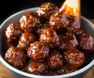Delicious bourbon honey BBQ meatballs served on a plate, perfect for parties and gatherings.