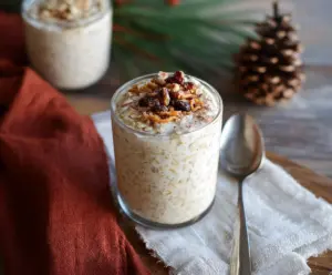 Creamy Eggnog Overnight Oats topped with cinnamon and nutmeg, perfect for a festive breakfast.