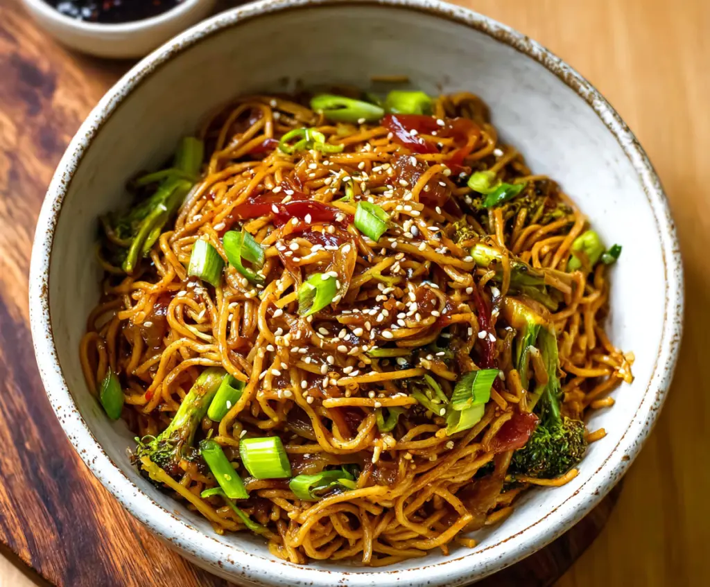 Delicious sesame garlic noodles with fresh herbs and a savory sauce